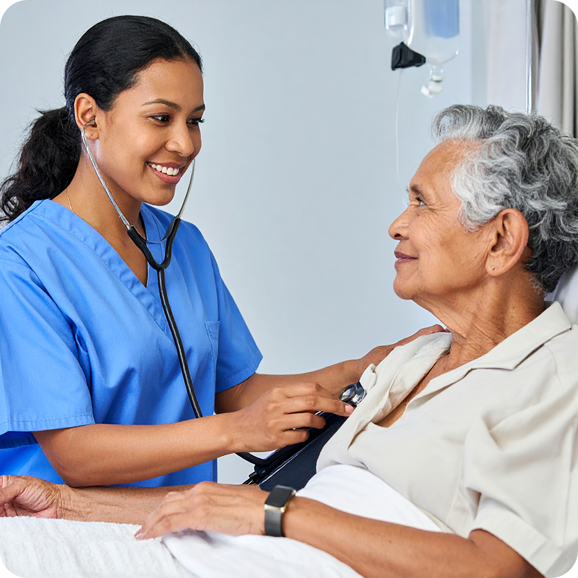 Woman and nurse hospital bed stethoscope Woman and nurse hospital bed stethoscope
